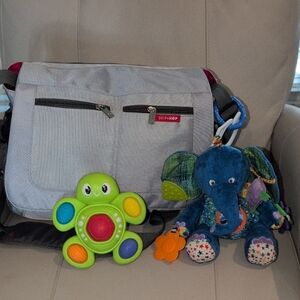 Gray And Red Skip Hop Baby Bag With An Elephant And Turtle Toy Including